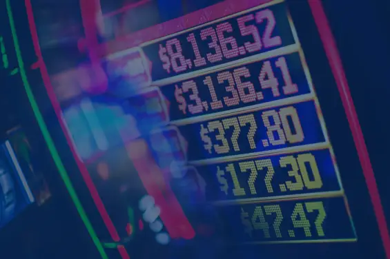 Close-up of a casino slot machine screen displaying jackpot amounts.